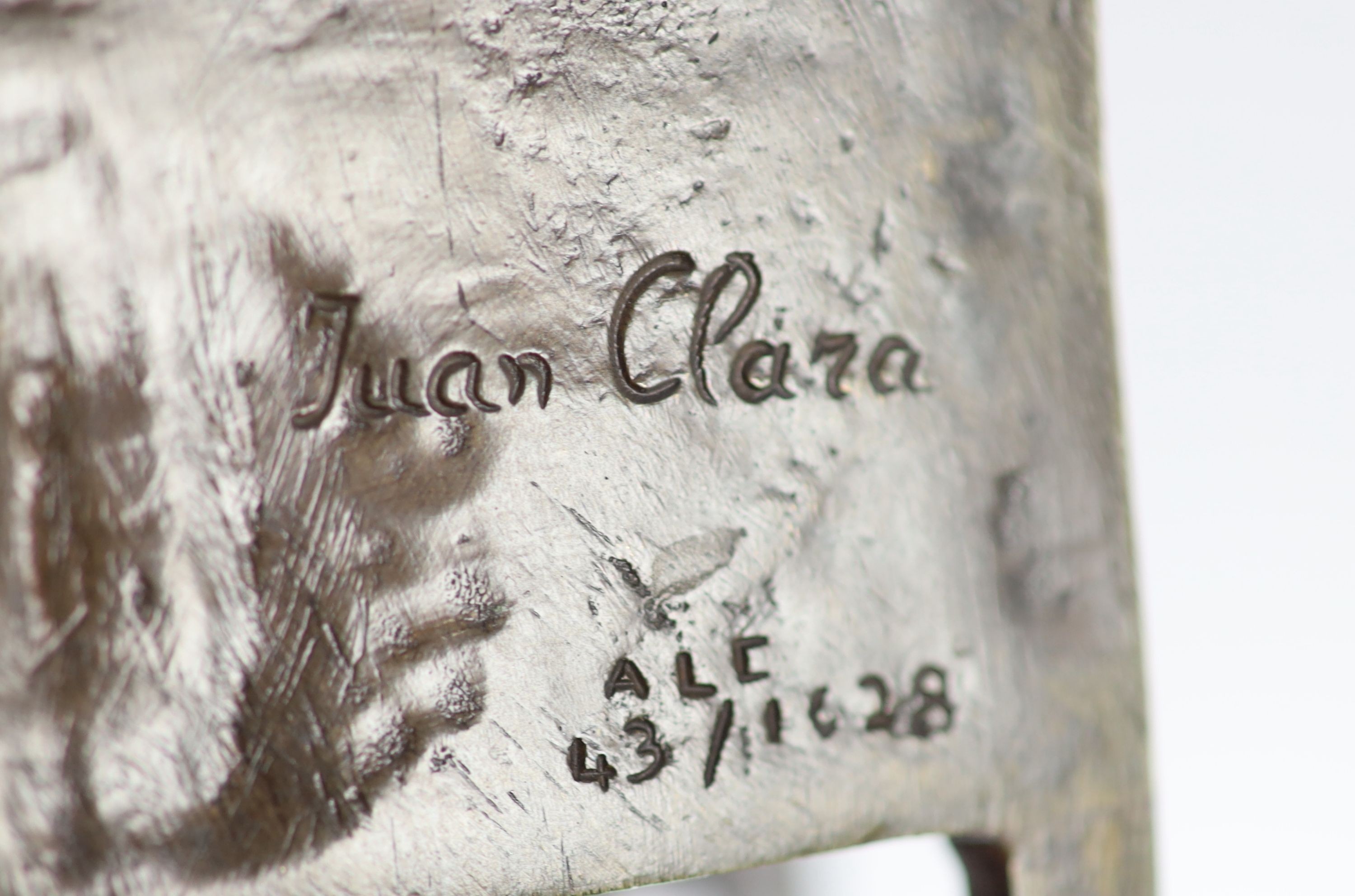 After Joan Clarà (1875 - 1958). A pair of bronze models of girls playing on chairs, height 15.5cm